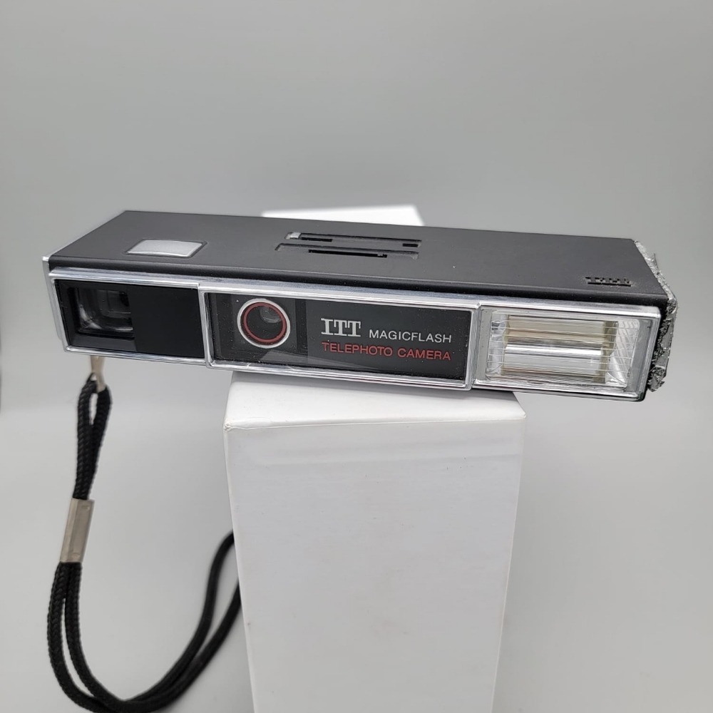 ⬇️ITT Magicflash Telephoto 110 Sub Mini Film Camera, hand-strap